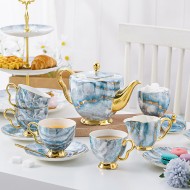 Elegant Bone China Tea Set with Saucers, Electric Blue Marble Pattern, and Coffee Cups - 15 Pieces Elegant Bone China Tea Set with Saucers, Electric Blue Marble Pattern, and Coffee Cups - 15 Pieces