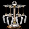 Crystal Glass Whirling Decanter with Silver and Gold Base and Wine Goblet Set