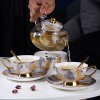 Elegant Bone China Tea Set with Glass Teapot, Infuser, Warmer, Coffee Cups, and Saucer - 10 Pieces