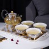 Elegant Bone China Tea Set with Glass Teapot, Infuser, Warmer, Coffee Cups, and Saucer - 10 Pieces